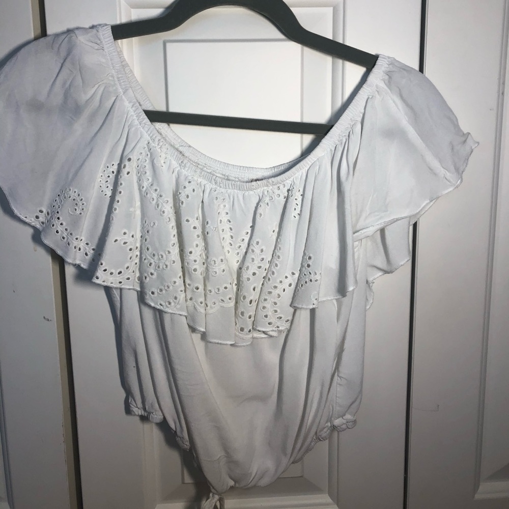 White ruffle top off the shoulder